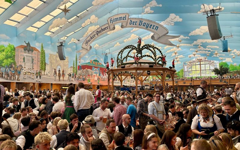 Inside the Hacker-Festzelt beer tent at the Oktoberfest, under its painted sky ceiling