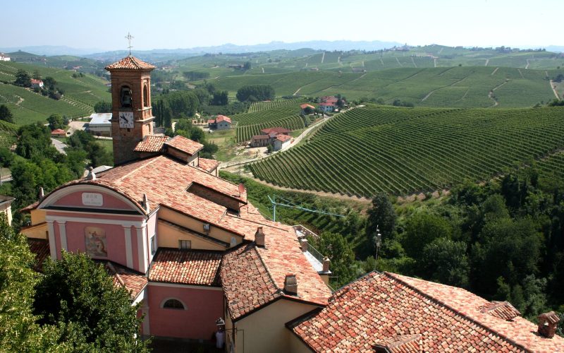 Barolo village church and vineyard hills of the Langhe in Piedmont