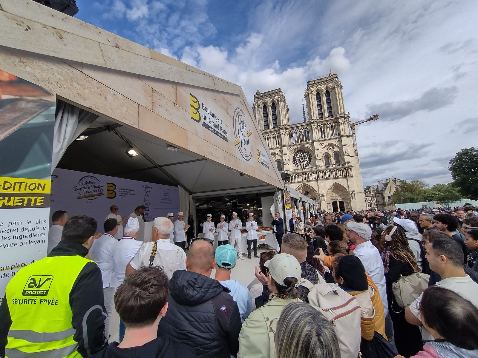 Bakers' tent of the Fête du Pain in front of Notre-Dame cathedral in Paris