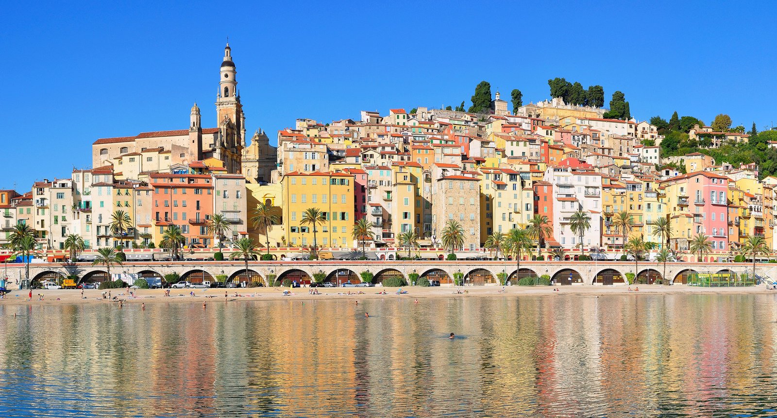 Colourful old town of Menton reflected in the sea on the Côte d'Azur
