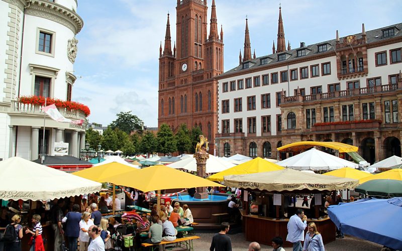 Colourful wine stalls in front of the Marktkirche on the Rheingauer Weinwoche in Wiesbaden