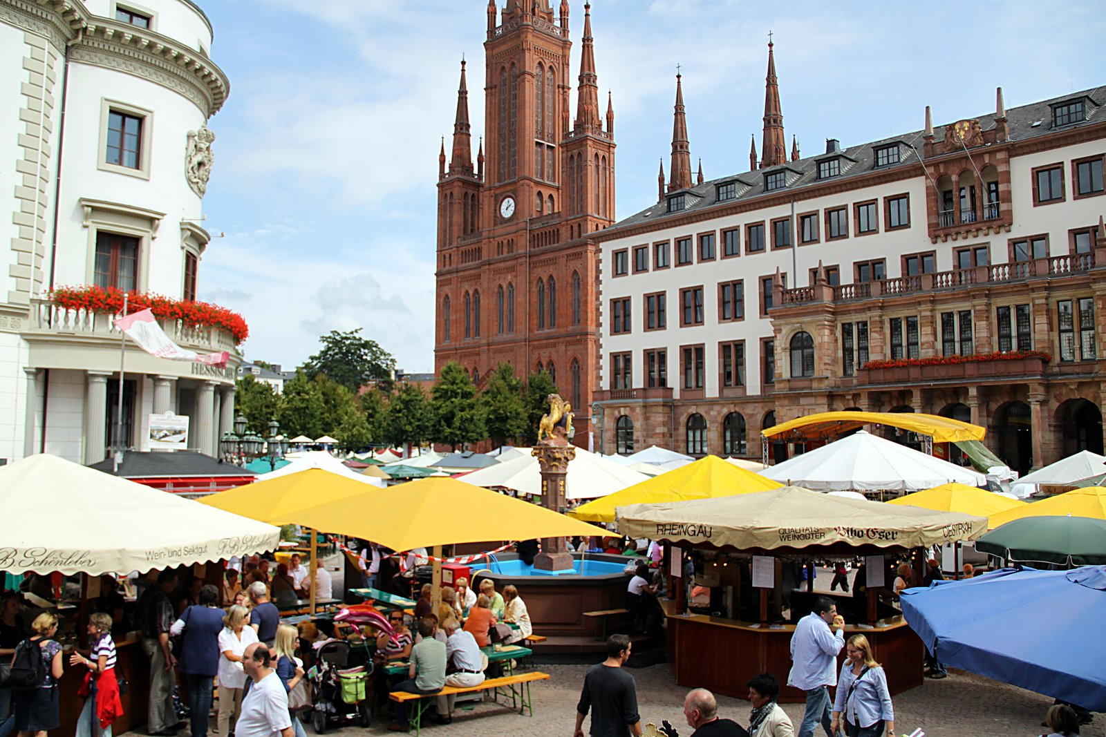 Colourful wine stalls in front of the Marktkirche on the Rheingauer Weinwoche in Wiesbaden