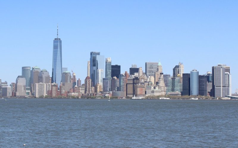 Lower Manhattan skyline across the harbour on a clear day