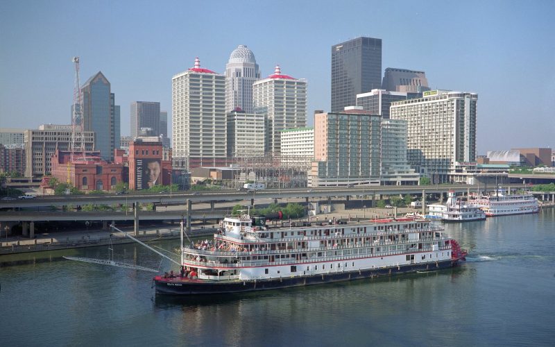 Louisville downtown skyline and a paddle steamboat on the Ohio River