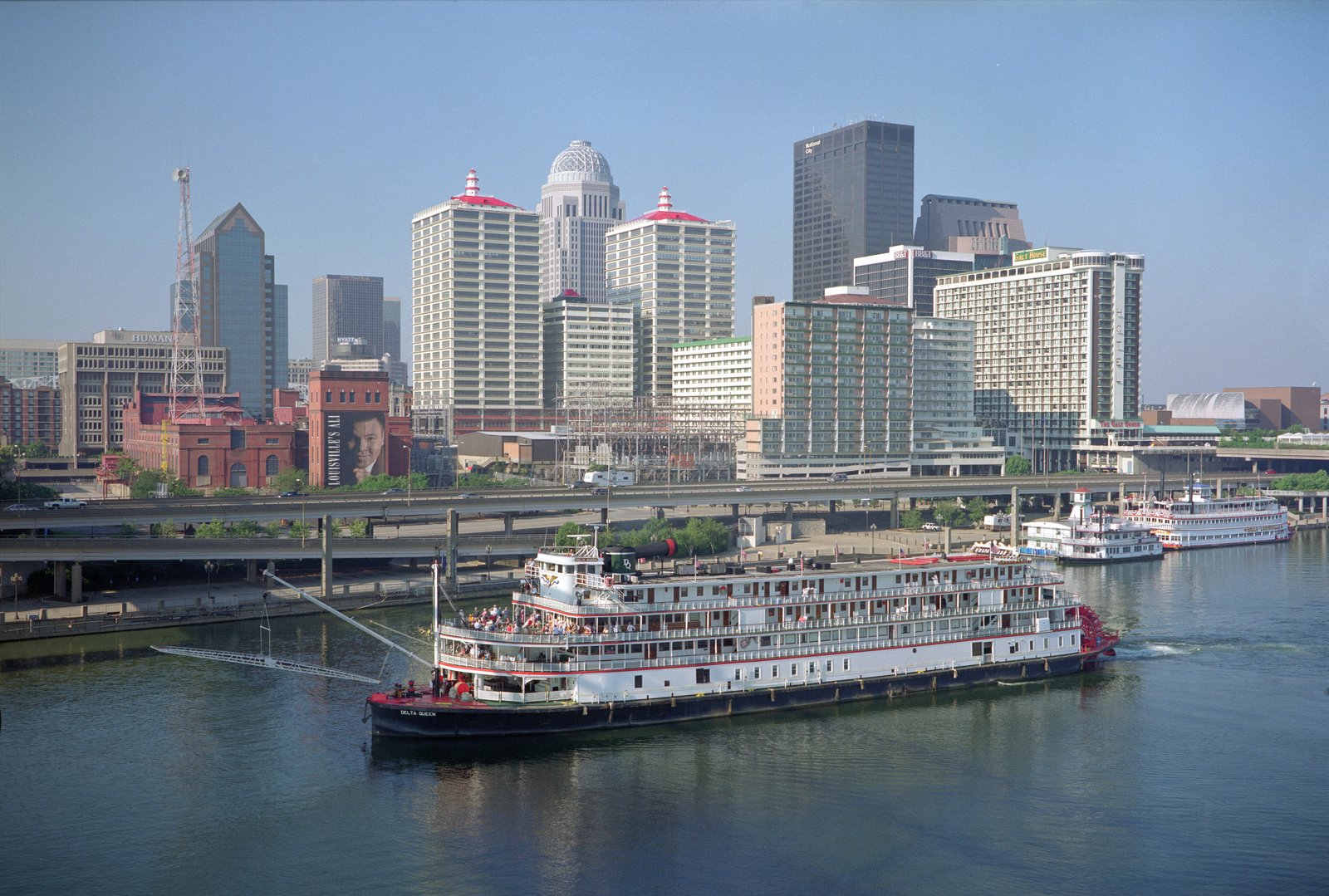 Louisville downtown skyline and a paddle steamboat on the Ohio River