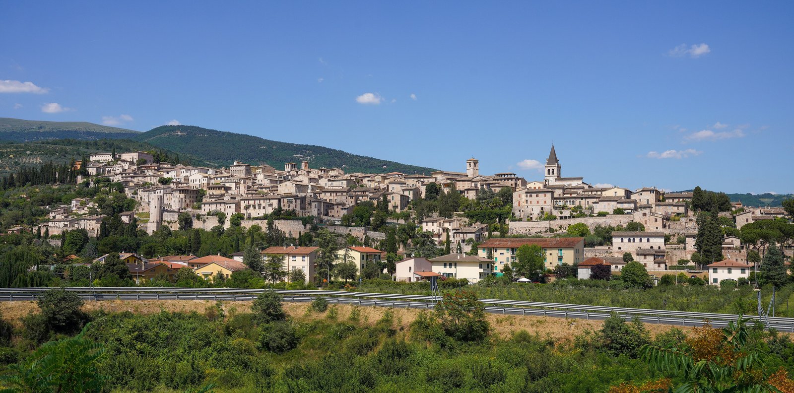 Hill town of Spello in Umbria under a blue sky