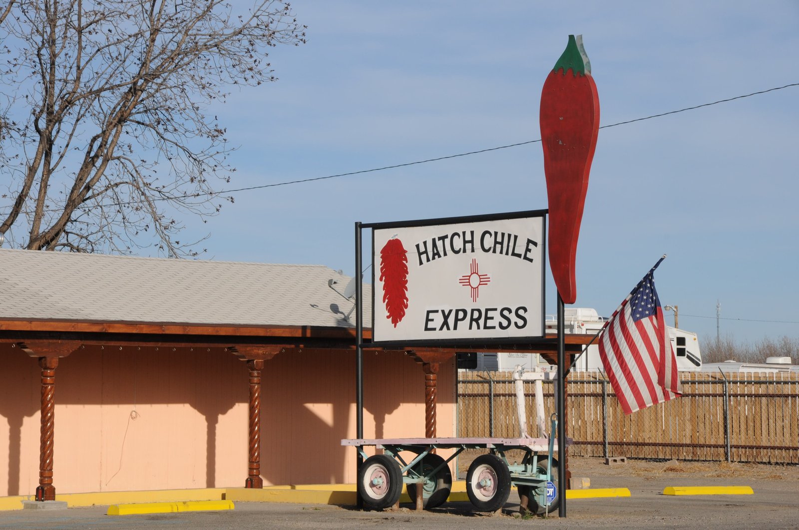 Hatch Chile Express roadside stand with giant red chile sign
