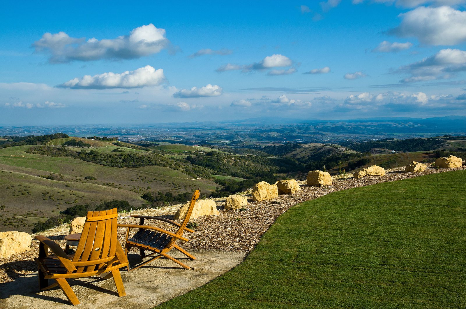 Rolling vineyard hills viewed from a winery terrace in Paso Robles