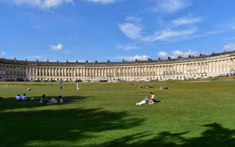 Royal Crescent lawn in Bath under a blue sky