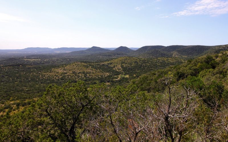 Wooded hills seen from an overlook in the Texas Hill Country