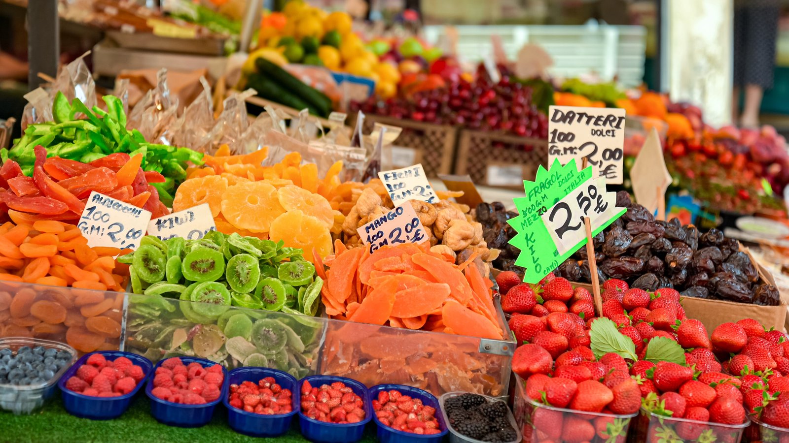 Fruit and dried fruit stalls at the Rialto market in Venice