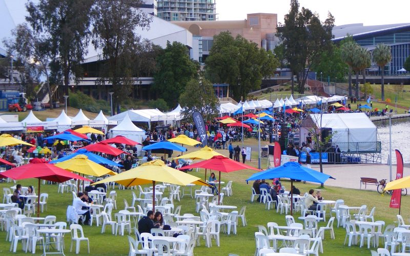 Tasting Australia food village with umbrellas in Elder Park, Adelaide