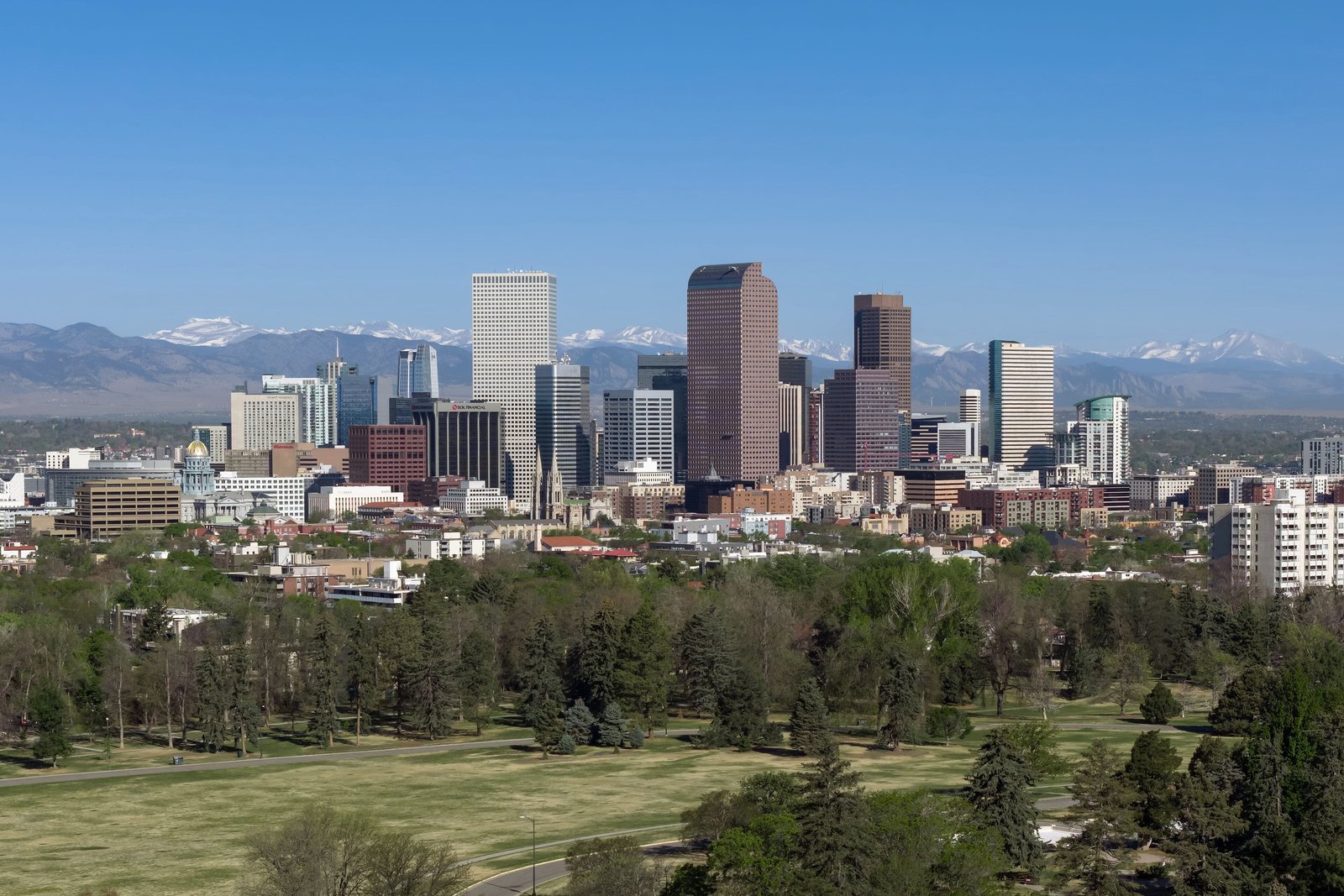 Downtown Denver skyline with the Rocky Mountains behind