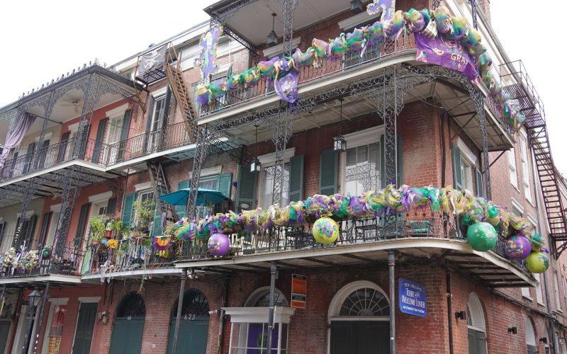 Wrought-iron galleries decorated with Mardi Gras beads in the French Quarter of New Orleans
