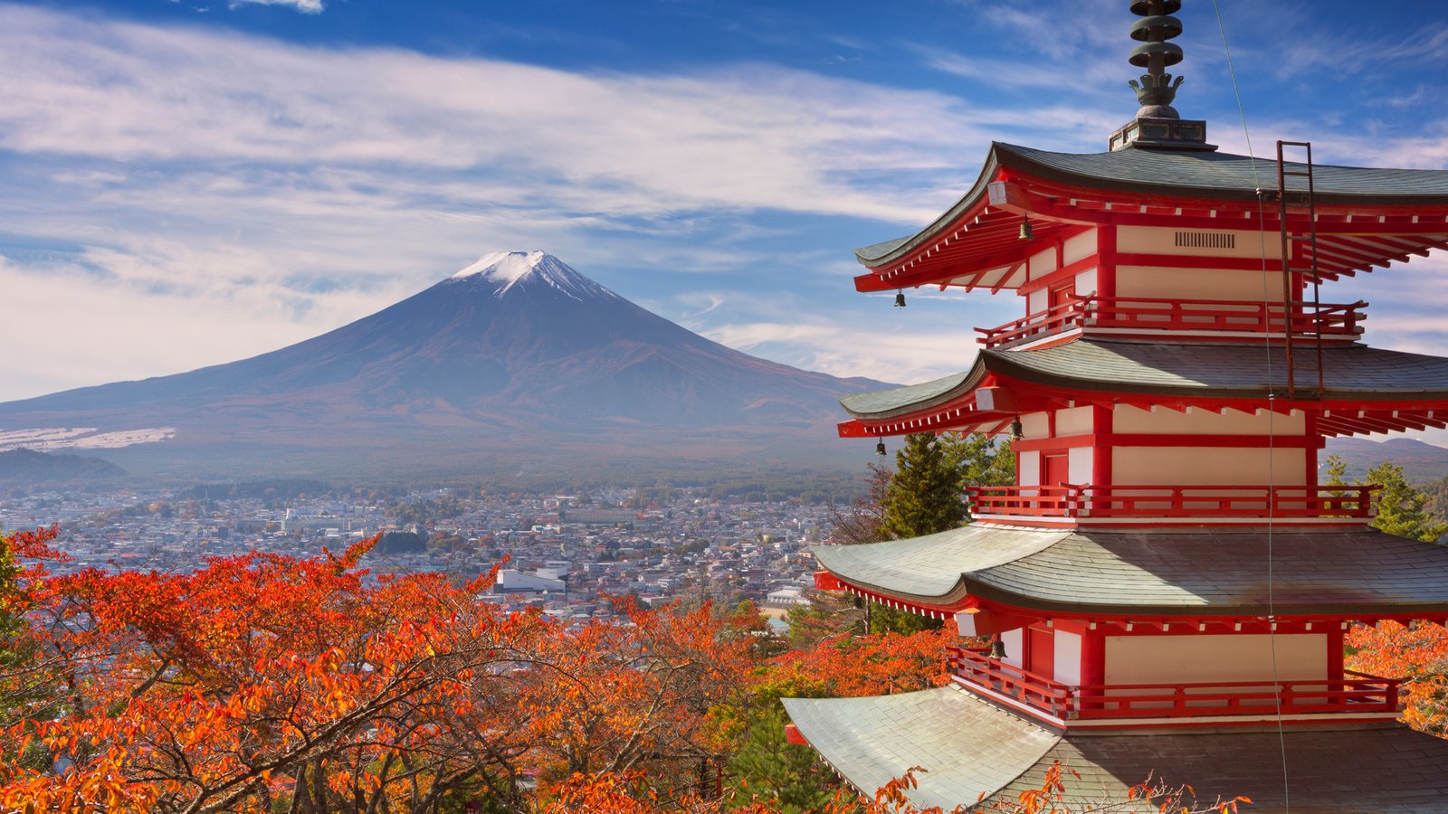 Chureito Pagoda and snow-capped Mount Fuji above autumn foliage