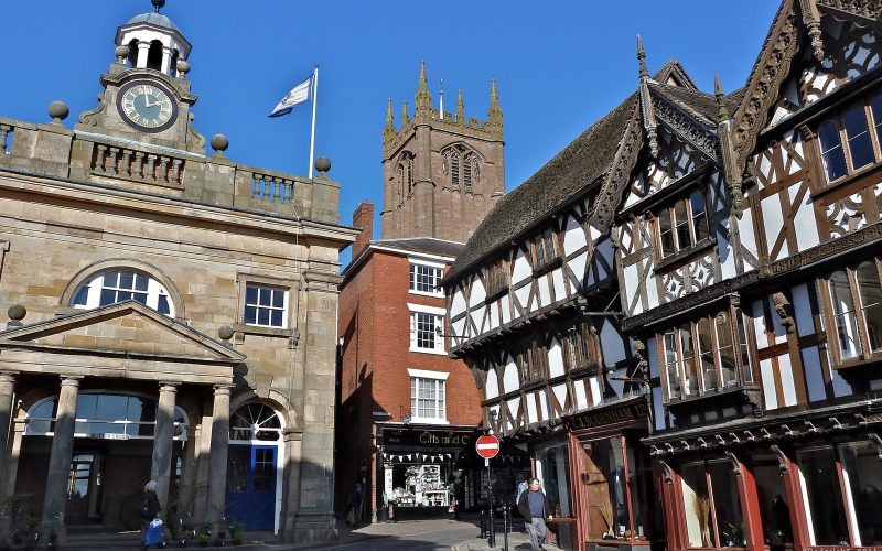 Half-timbered buildings, market hall and church tower in the centre of Ludlow