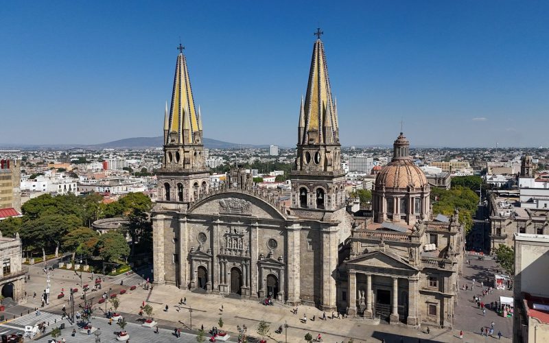 Guadalajara Cathedral twin spires over the city centre under a blue sky