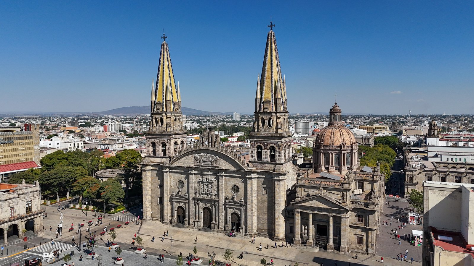 Guadalajara Cathedral twin spires over the city centre under a blue sky