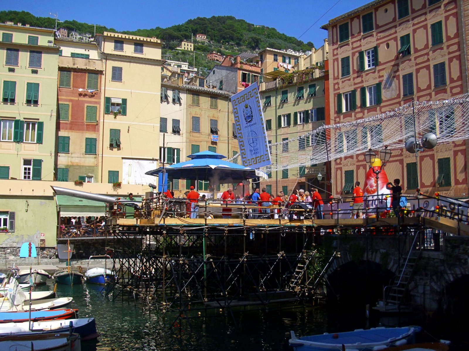 Festival stage on the harbour of Camogli below the pastel-coloured houses