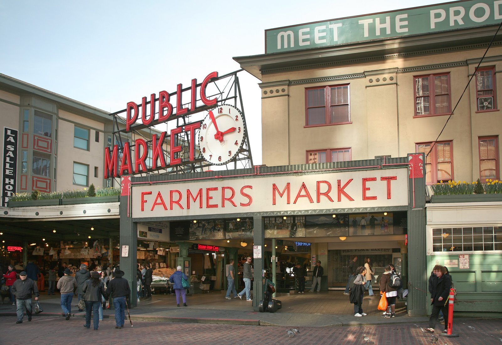 Pike Place Public Market entrance with its clock and sign in Seattle