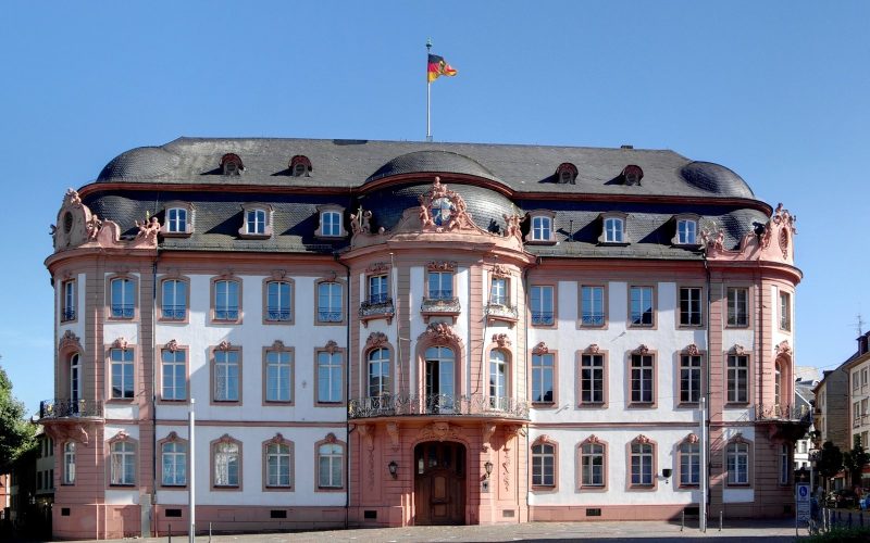 Baroque Osteiner Hof facade in Mainz under a blue sky