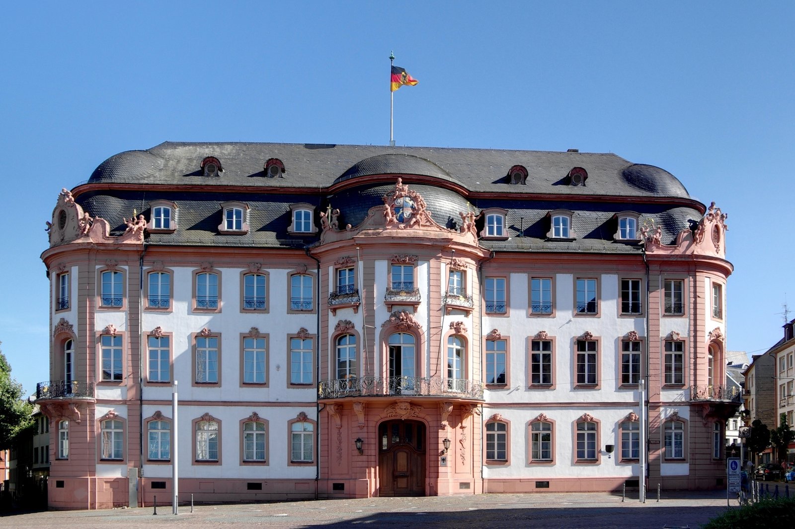 Baroque Osteiner Hof facade in Mainz under a blue sky
