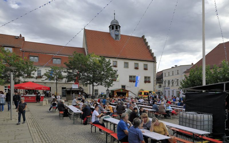 Market square of Freyburg with beer benches and bunting during the Winzerfest