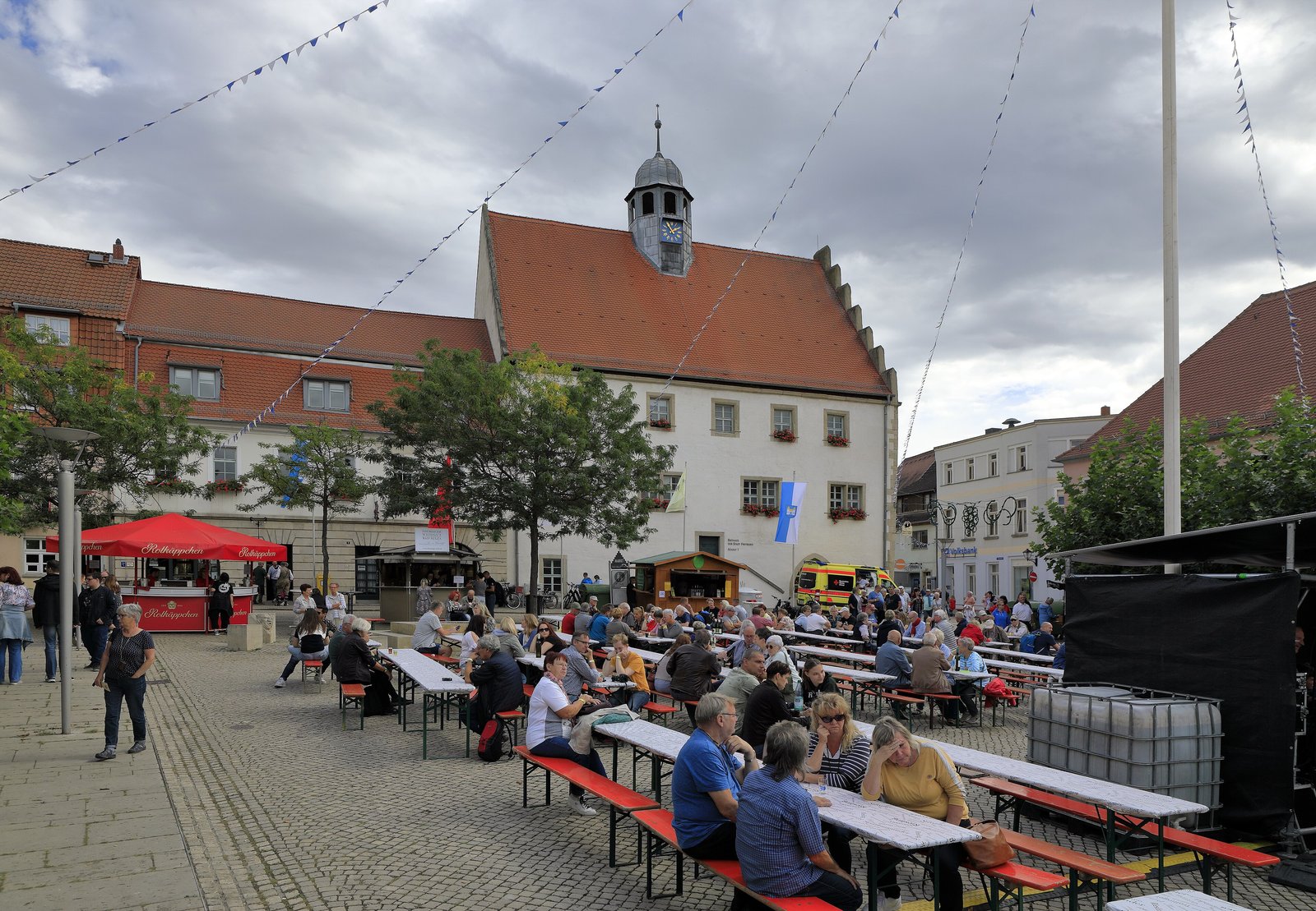 Market square of Freyburg with beer benches and bunting during the Winzerfest