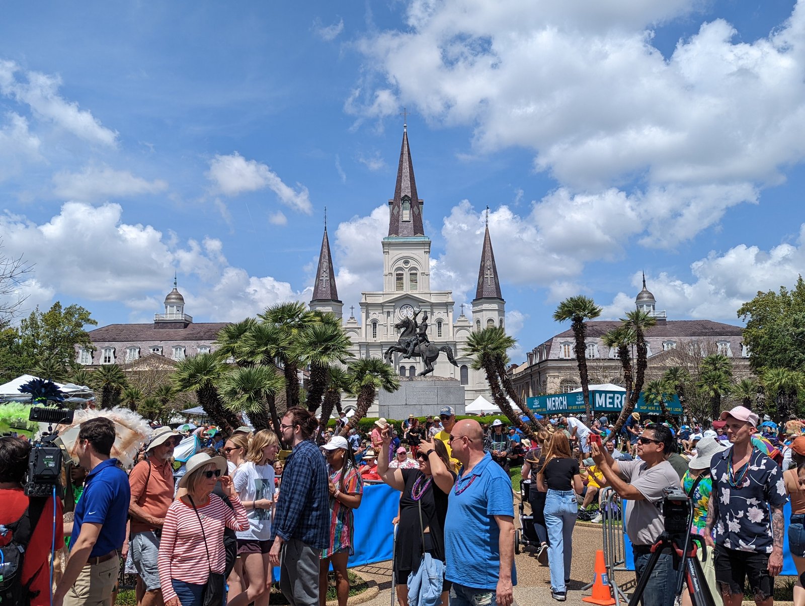Festival crowd in Jackson Square with St. Louis Cathedral behind, New Orleans