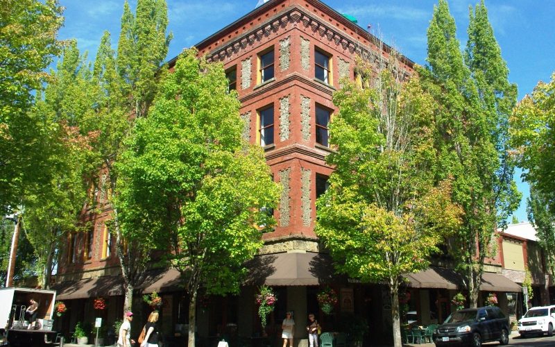 Hotel Oregon brick building and street trees in downtown McMinnville