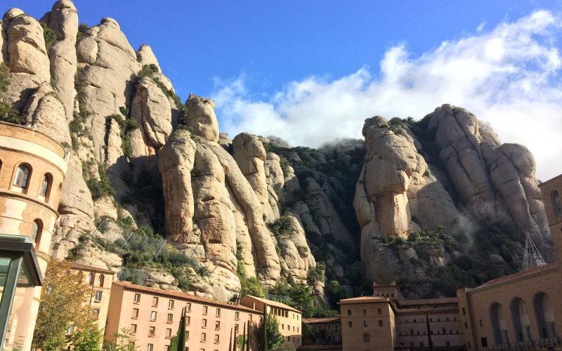 Montserrat monastery below the jagged rock pinnacles of Catalonia