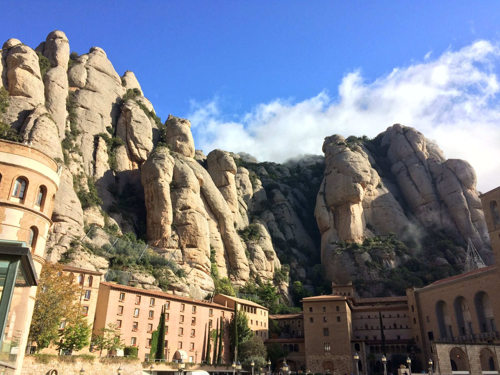 Montserrat monastery below the jagged rock pinnacles of Catalonia
