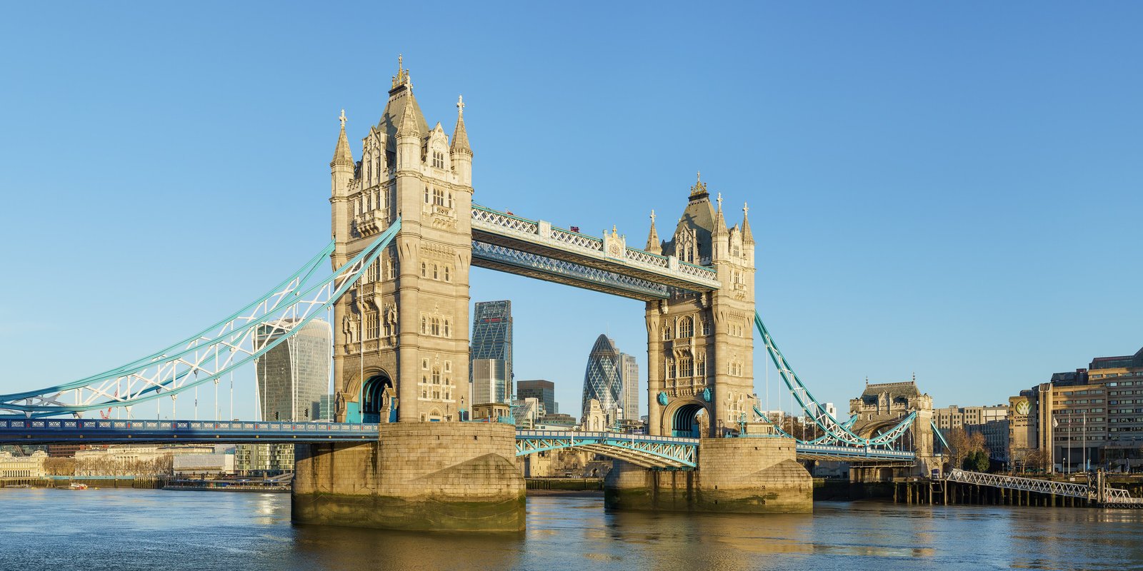 Tower Bridge and the City skyline on the Thames at golden hour